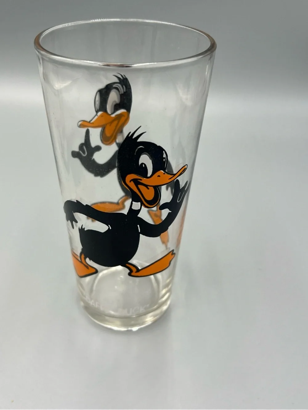 Pepsi Daffy Duck Clear Glass Tumbler with Black and Orange Artwork